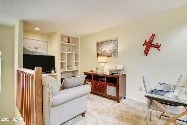 carpeted living room with built in features and a textured ceiling