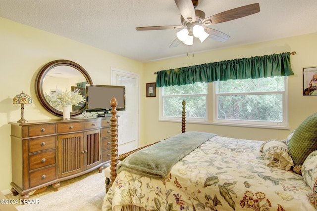 2051 Cornell Pl Unit 26, Port Orange, FL 32128 - bedroom featuring light colored carpet and a ceiling fan