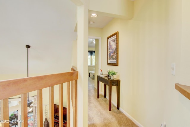 2051 Cornell Pl Unit 26, Port Orange, FL 32128 - hallway featuring light carpet and baseboards