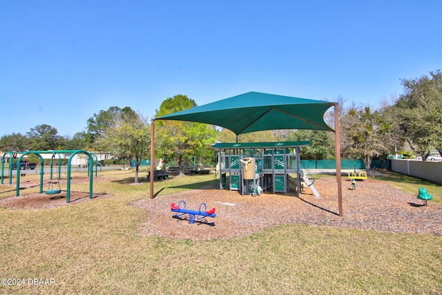 view of jungle gym with a yard