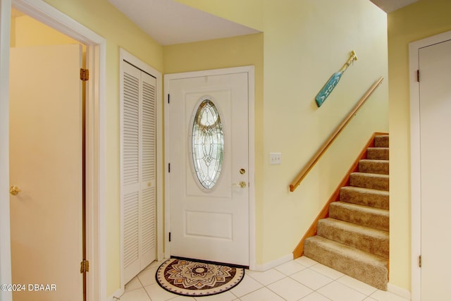 2051 Cornell Pl Unit 26, Port Orange, FL 32128 - entrance foyer featuring light tile patterned floors and stairs