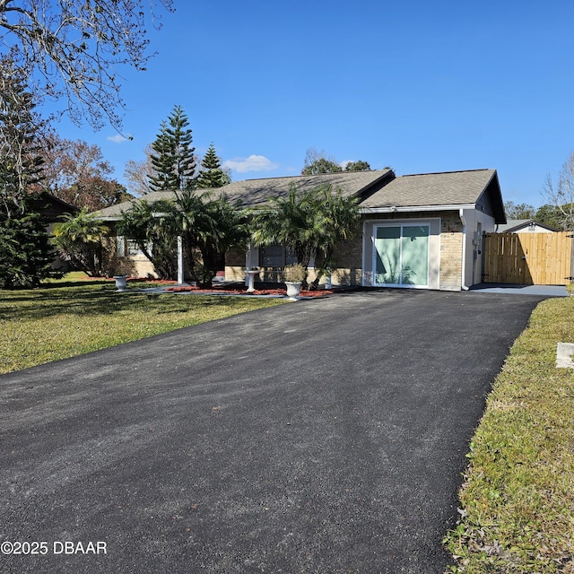 view of front of home featuring a front lawn