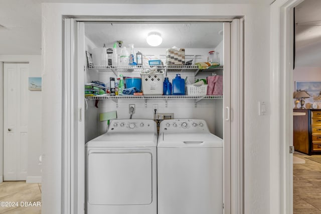 4141 S Atlantic Ave Unit 502, New Smyrna Beach, FL 32169 - laundry room with washer and dryer