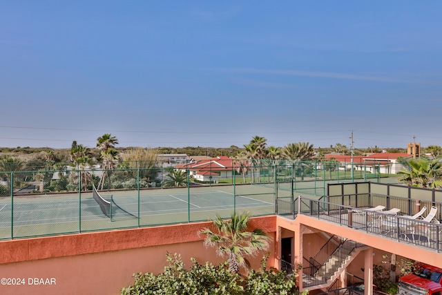 4141 S Atlantic Ave Unit 502, New Smyrna Beach, FL 32169 - view of tennis court featuring stairs