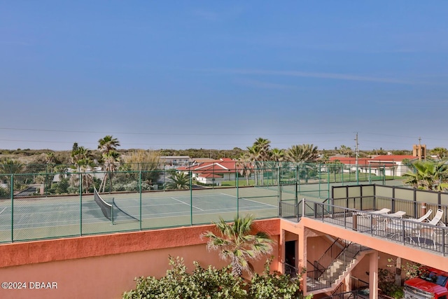 4141 S Atlantic Ave Unit 502, New Smyrna Beach, FL 32169 - view of tennis court featuring stairway
