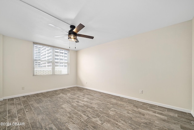2800 N Atlantic Ave Unit 101, Daytona Beach, FL 32118 - empty room featuring wood finished floors, ceiling fan, and baseboards