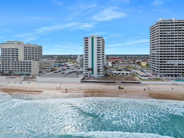 bird's eye view with a view of the beach and a water view