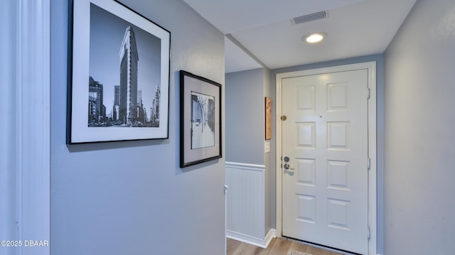 doorway to outside featuring light wood-type flooring