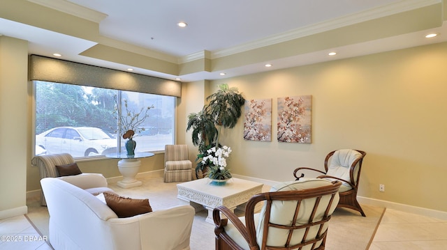 sitting room with crown molding and light tile patterned flooring