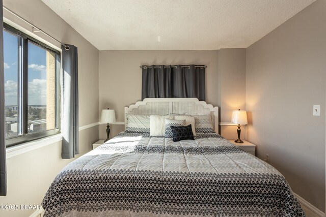 bedroom featuring a textured ceiling