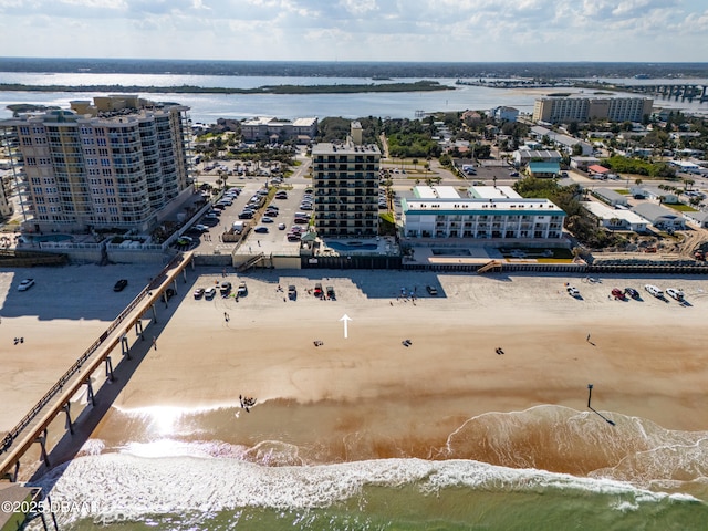 aerial view with a beach view and a water view