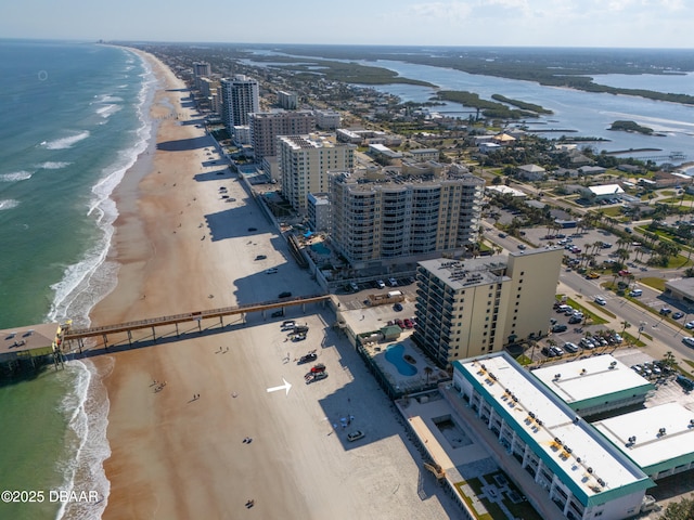 bird's eye view with a beach view and a water view