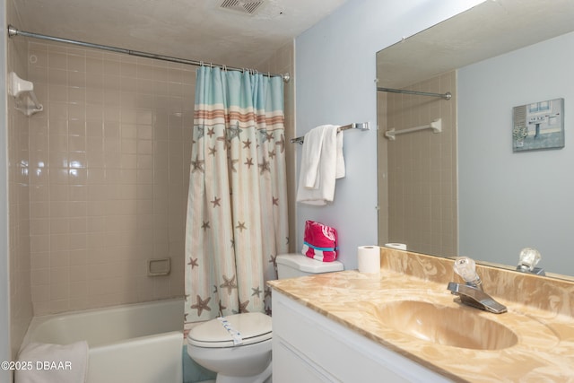 full bathroom featuring vanity, toilet, and shower / bath combo with shower curtain