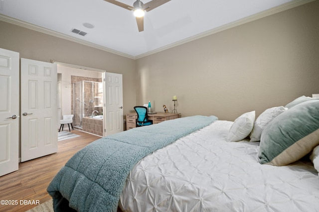 bedroom with hardwood / wood-style flooring, crown molding, and ceiling fan