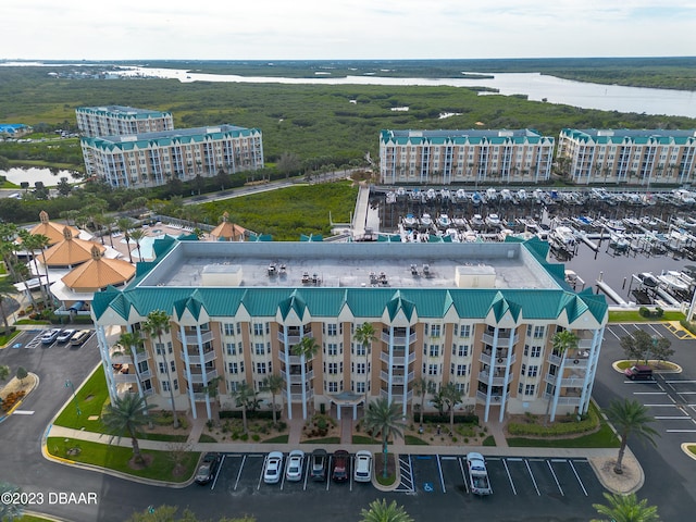 birds eye view of property featuring a water view