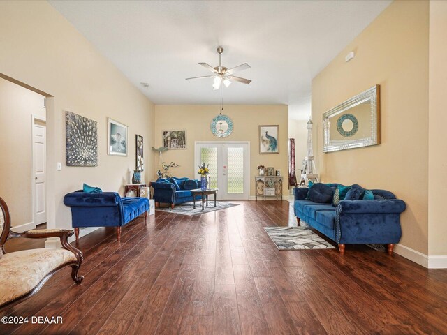 living room featuring dark hardwood / wood-style flooring, french doors, and ceiling fan