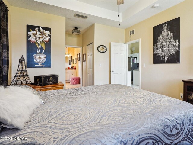 bedroom featuring ensuite bathroom