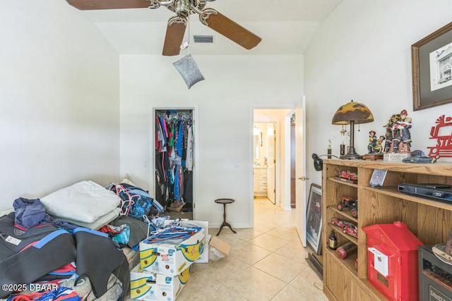 510 Torres Pl, Lady Lake, FL 32159 - bedroom with light tile patterned floors, ceiling fan, and a closet