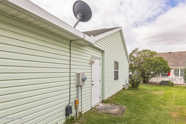 510 Torres Pl, Lady Lake, FL 32159 - view of property exterior with a yard and a shingled roof
