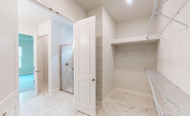 bathroom featuring an enclosed shower