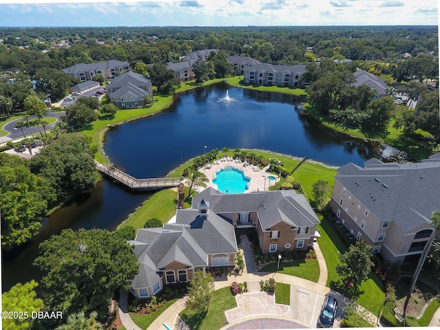 940 Village Trl Unit 2-106, Port Orange, FL 32127 - drone / aerial view of a pool and a nearby body of water