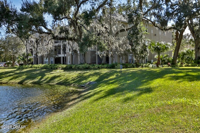 940 Village Trl Unit 2-106, Port Orange, FL 32127 - view of grassy yard