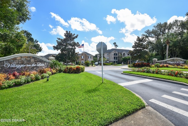 940 Village Trl Unit 2-106, Port Orange, FL 32127 - view of asphalt road featuring a residential view