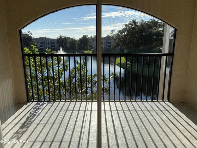 940 Village Trl Unit 2-106, Port Orange, FL 32127 - balcony featuring a water view