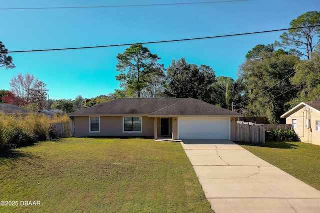 ranch-style house featuring a garage and a front lawn