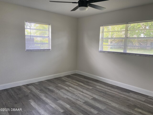 304 Jane Ann St, Port Orange, FL 32127 - empty room with ceiling fan and dark wood-type flooring
