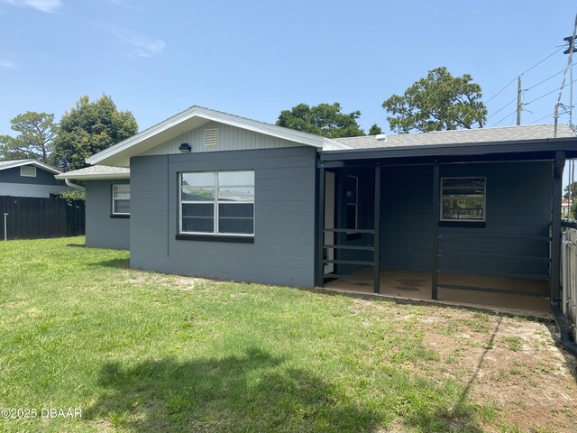 304 Jane Ann St, Port Orange, FL 32127 - rear view of house with roof with shingles