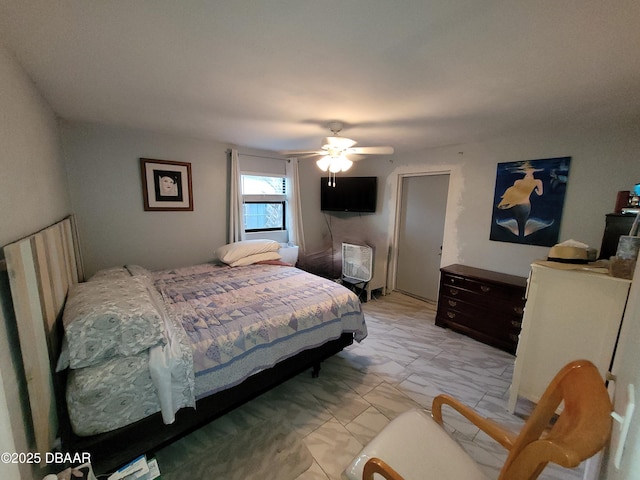 bedroom featuring ceiling fan