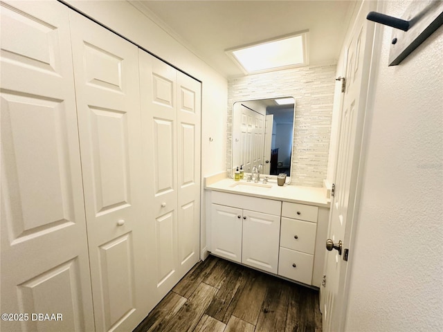 84 Heather Point Ct, New Smyrna Beach, FL 32169 - bathroom with vanity and wood finished floors