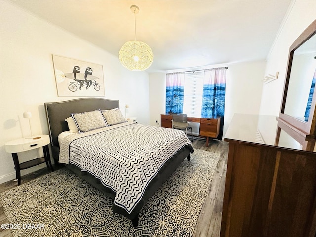 84 Heather Point Ct, New Smyrna Beach, FL 32169 - bedroom featuring wood finished floors and baseboards