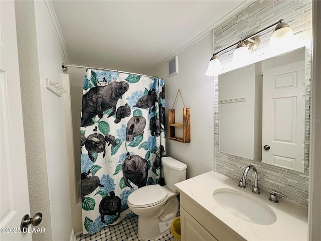 84 Heather Point Ct, New Smyrna Beach, FL 32169 - bathroom with ornamental molding, vanity, toilet, tasteful backsplash, and a shower with curtain