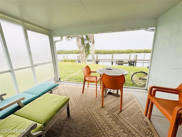 84 Heather Point Ct, New Smyrna Beach, FL 32169 - sunroom with a water view and a textured wall