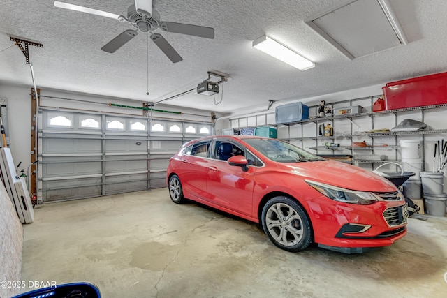 garage featuring ceiling fan and a garage door opener