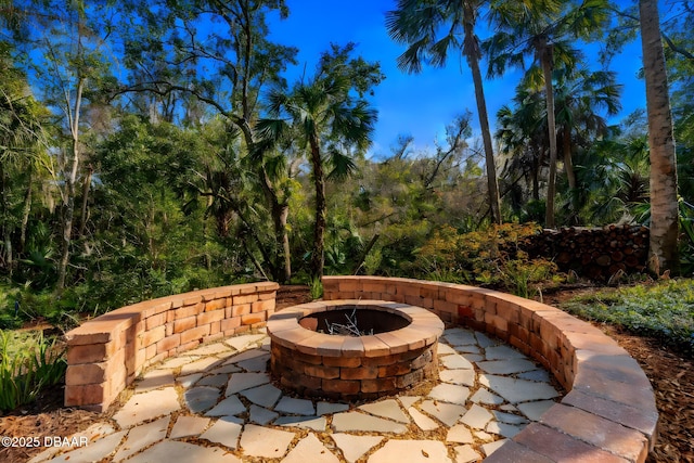 view of patio / terrace featuring a fire pit