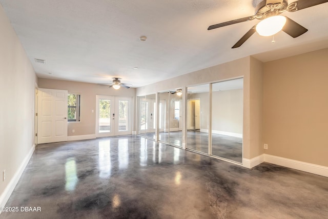 unfurnished room featuring ceiling fan