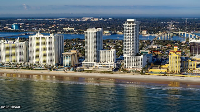 view of city featuring a view of the beach and a water view