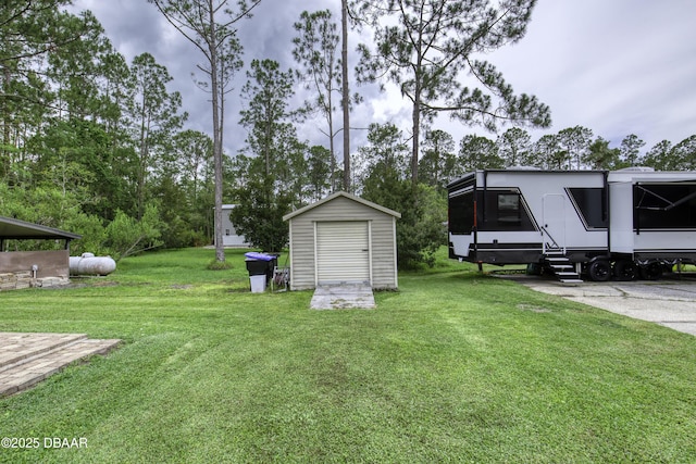 255 Woodhaven Cir W, Ormond Beach, FL 32174 - view of grassy yard with a storage unit