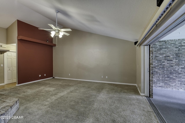 255 Woodhaven Cir W, Ormond Beach, FL 32174 - unfurnished living room with ceiling fan, lofted ceiling, and carpet flooring