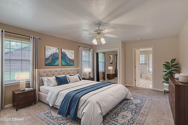255 Woodhaven Cir W, Ormond Beach, FL 32174 - bedroom with multiple windows, light carpet, and a ceiling fan