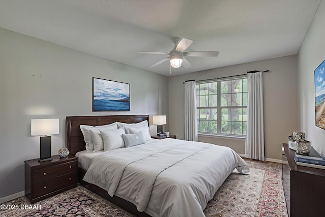 255 Woodhaven Cir W, Ormond Beach, FL 32174 - bedroom featuring baseboards and a ceiling fan