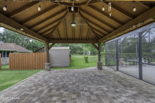 255 Woodhaven Cir W, Ormond Beach, FL 32174 - view of patio / terrace with a shed and a lanai