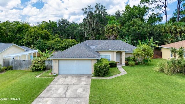 single story home featuring driveway, a front yard, fence, and stucco siding