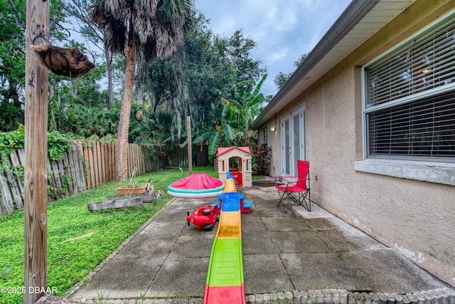 view of patio with a playground