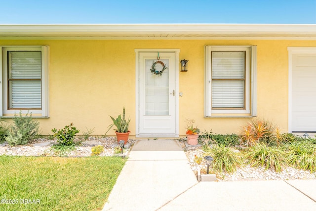 3035 Victory Palm Dr, Edgewater, FL 32141 - property entrance featuring stucco siding