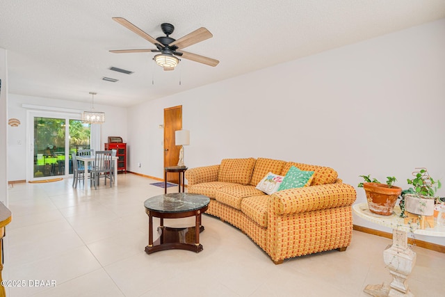 3035 Victory Palm Dr, Edgewater, FL 32141 - living area featuring ceiling fan, baseboards, and a chandelier