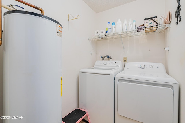 3035 Victory Palm Dr, Edgewater, FL 32141 - laundry area featuring water heater, independent washer and dryer, and a textured ceiling